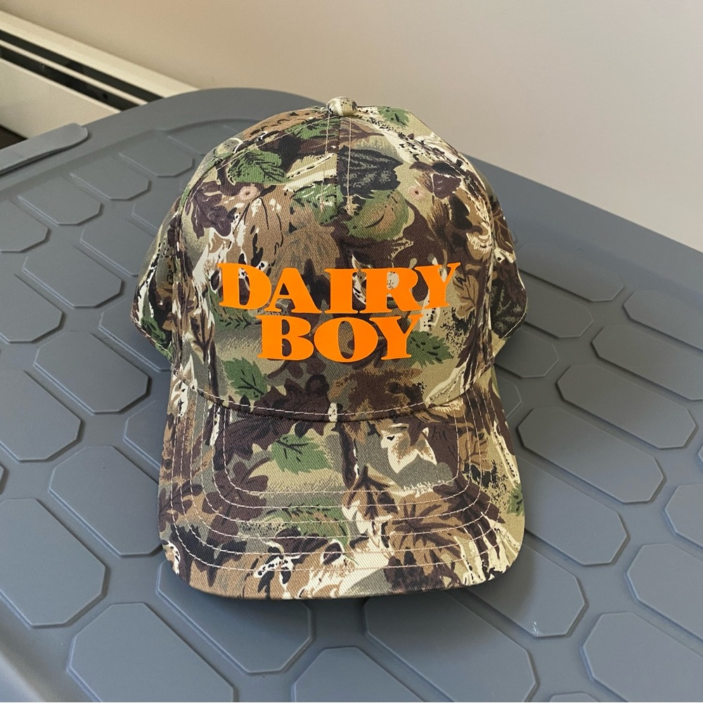 Like new camo Dairy Boy trucker hat